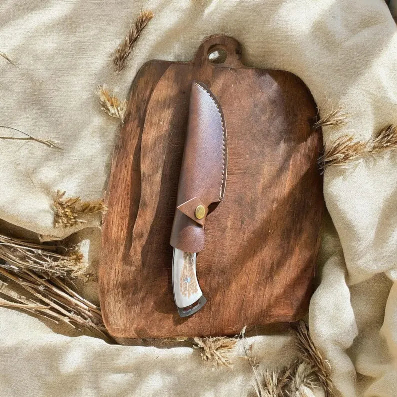 Deer Antler Handle Hunting Knife: D2 Steel Outdoor Survival Tool with pure leather sheath.