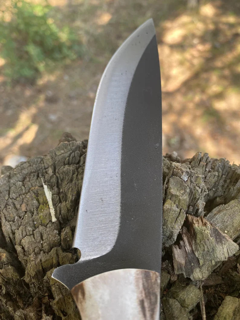 Deer Antler Handle Hunting Knife: D2 Steel Outdoor Survival Tool with pure leather sheath.